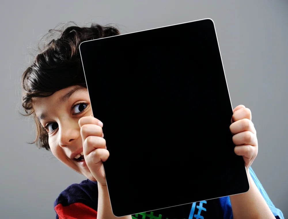 Cute kid with Tablet